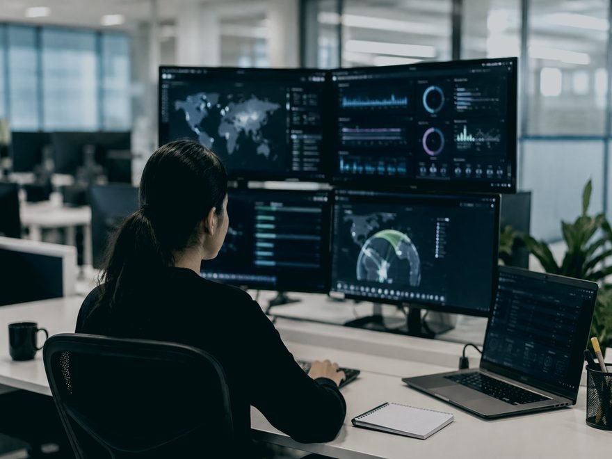 Security analyst monitoring compliance dashboards